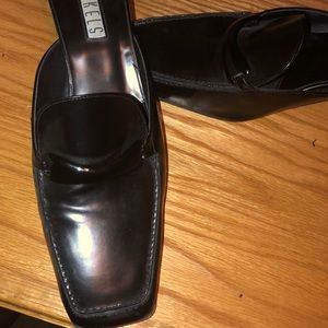 Black leather mule by Nickles.